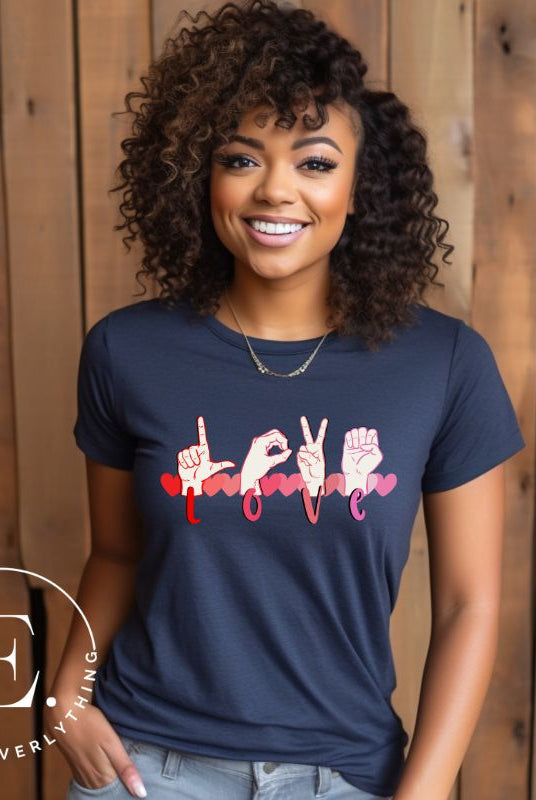 Express love in a visually stunning way with our downloadable PNG sublimation t-shirt design! Featuring American Sign Language (ASL) hands spelling 'Love' with hearts running through them on a navy shirt. 
