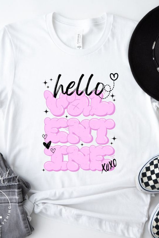 Make a bold statement this Valentine's Day with our street-style graffiti tee! Featuring "Hello Valentine" In eye-catching bubble lettering, on a white shirt. 