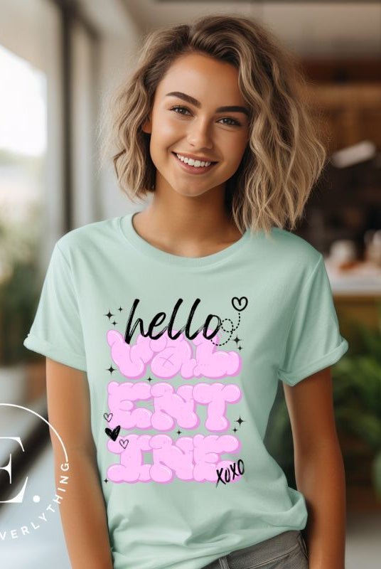 Make a bold statement this Valentine's Day with our street-style graffiti tee! Featuring "Hello Valentine" In eye-catching bubble lettering, on a mint shirt. 