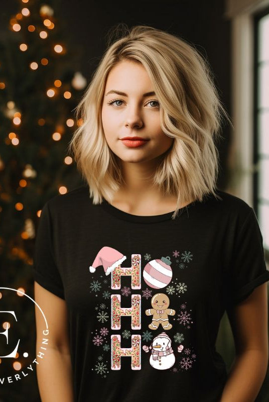 Add a whimsical touch to your holiday wardrobe with our gingerbread "Ho Ho Ho" Christmas shirt on a black colored shirt. 