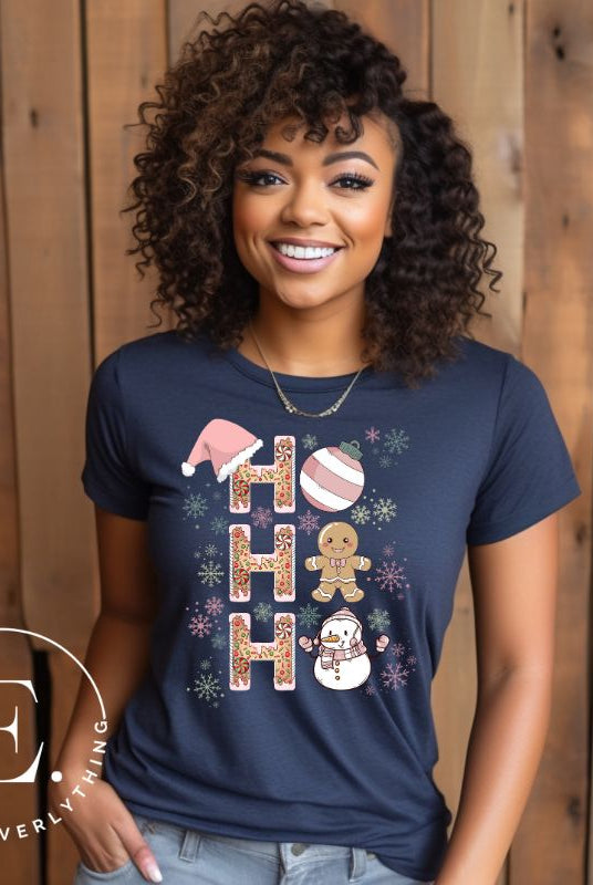 Add a whimsical touch to your holiday wardrobe with our gingerbread "Ho Ho Ho" Christmas shirt on a navy colored shirt.