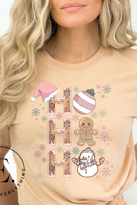 Add a whimsical touch to your holiday wardrobe with our gingerbread "Ho Ho Ho" Christmas shirt on a tan colored shirt.