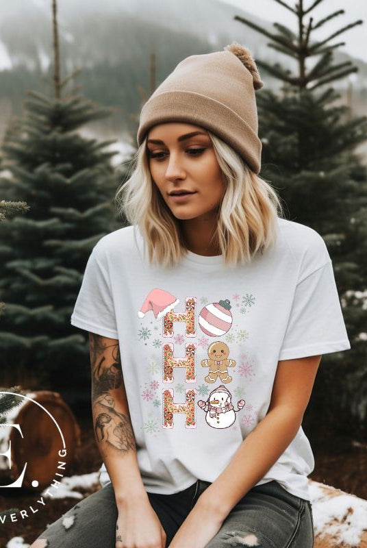 Add a whimsical touch to your holiday wardrobe with our gingerbread "Ho Ho Ho" Christmas shirt on a white colored shirt.