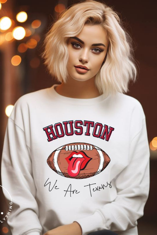 Embrace your Houston Texans pride with our exclusive sweatshirt. It features the team's name and an empowering slogan, "We Are Texans." On a white sweatshirt. 