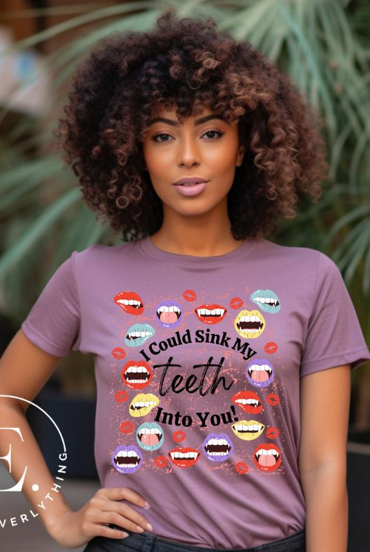 Sink your teeth into Halloween style with our vampire lips shirt. Adorned with a collection of seductive vampire lips, this shirt mesmerizes with its allure. The cheeky message, 'I could sink my teeth into you,' adds a playful twist on a purple shirt. 