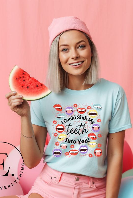 Sink your teeth into Halloween style with our vampire lips shirt. Adorned with a collection of seductive vampire lips, this shirt mesmerizes with its allure. The cheeky message, 'I could sink my teeth into you,' adds a playful twist on a blue shirt. 