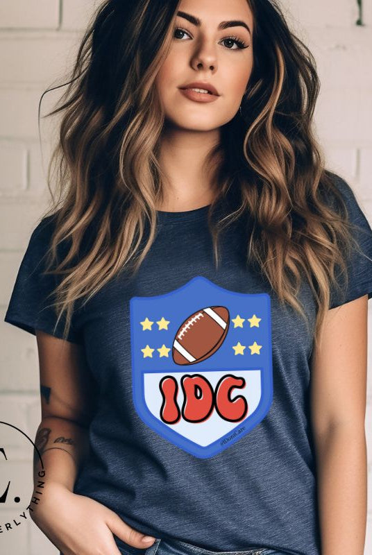 Elevate your game day vibe with our Bella Canvas 3001 unisex tee featuring a cheeky NFL logo design with the letters IDC in place of NFL- because sometimes, we just don't care who wins! Show your laid-back fandom and comfy style on this navy shirt. 
