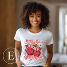 Express your affection with our charming Valentine's Day shirt! Featuring adorable cherries and the sweet message " I Love You Cherry Much," on a white shirt