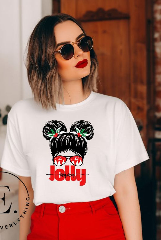 Get into the holiday spirit with our "Jolly Mama" Christmas Shirt! Featuring a stylish mom rocking pigtail buns and festive Christmas Sunglasses on a white colored shirt. 