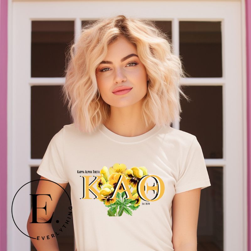 Get ready to show your Kappa Alpha Theta pride with our stunning sublimation t-shirt download featuring the sorority's letters and the elegant black and gold pansy on a soft cream shirt. 
