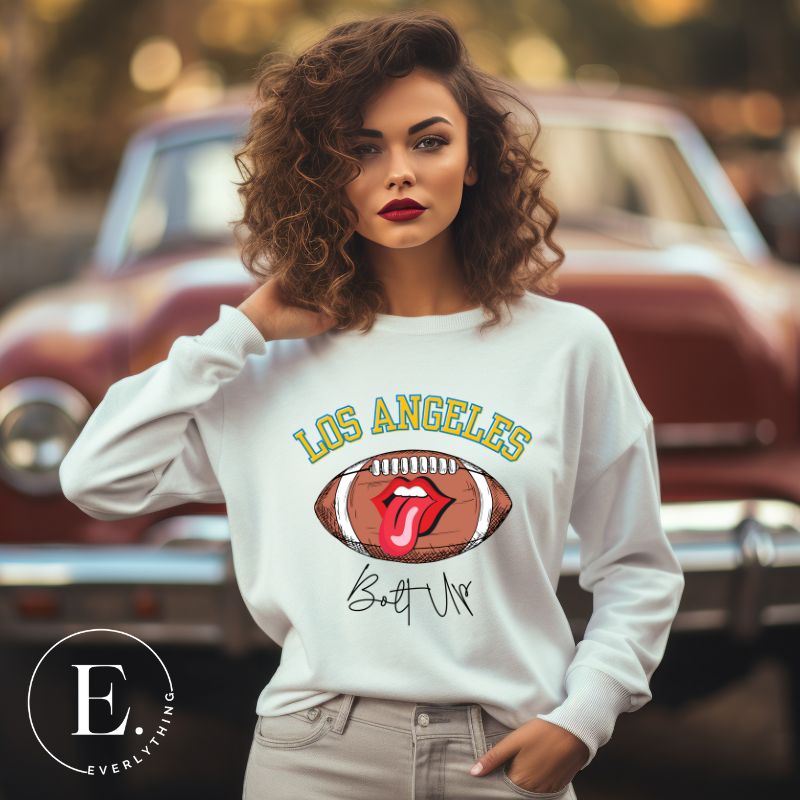 Show off your Los Angeles Chargers pride with our exclusive sweatshirt. It features the team's name and the electrifying slogan "Bolt Up." On a white sweatshirt. 