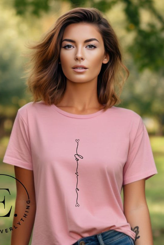Elevate your everyday look with with our modern and trendy simple shirt, featuring the word "Love" elegantly displayed horizontally down the center of a pink shirt. 