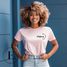 Celebrate the many roles of motherhood with our versatile t-shirt. The word 'Mama' on the front pocket also includes 'mom,' 'friend,' and 'bruh.' On a pink shirt.