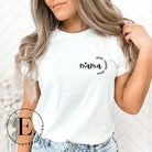 Celebrate the many roles of motherhood with our versatile t-shirt. The word 'Mama' on the front pocket also includes 'mom,' 'friend,' and 'bruh.' On a white shirt. 