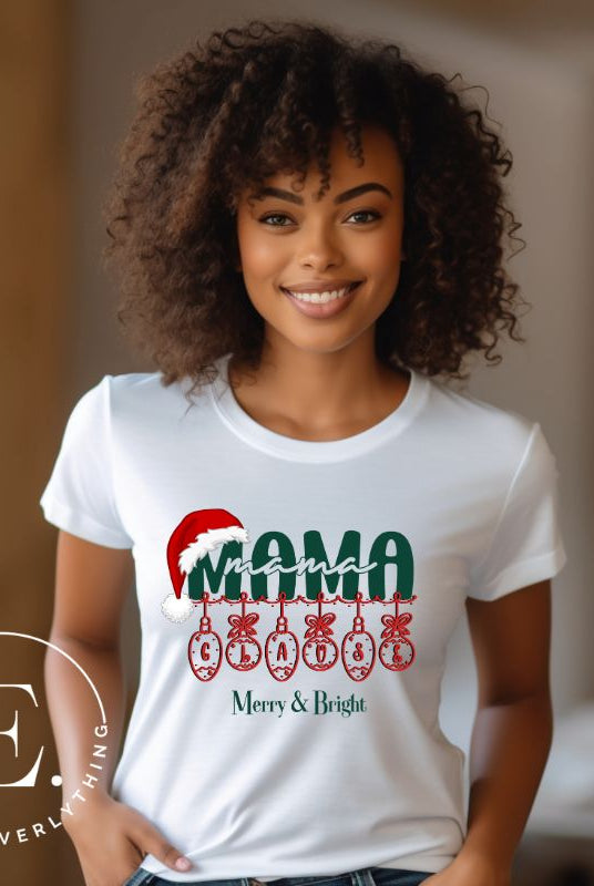 Experience the enchantment of Christmas with our Mama Claus shirt, on a white colored shirt. 