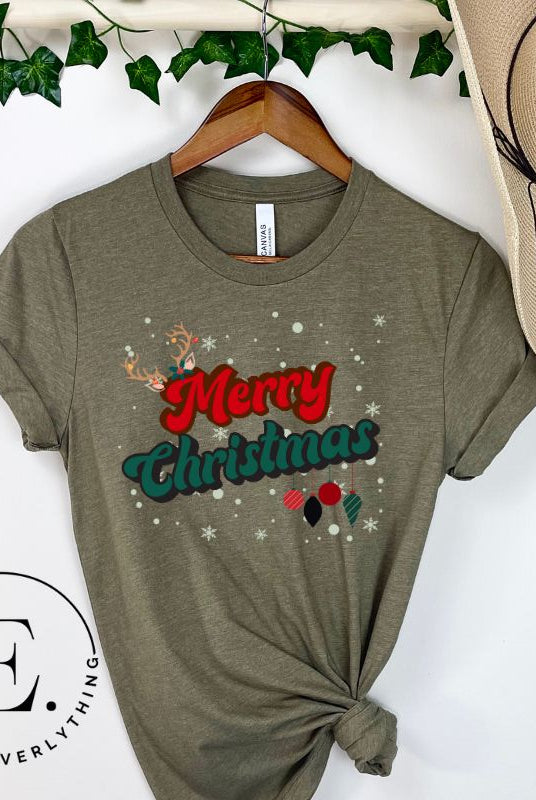 Get ready to take a trip down memory lane with our Merry Christmas retro letters shirt on a green colored shirt. 