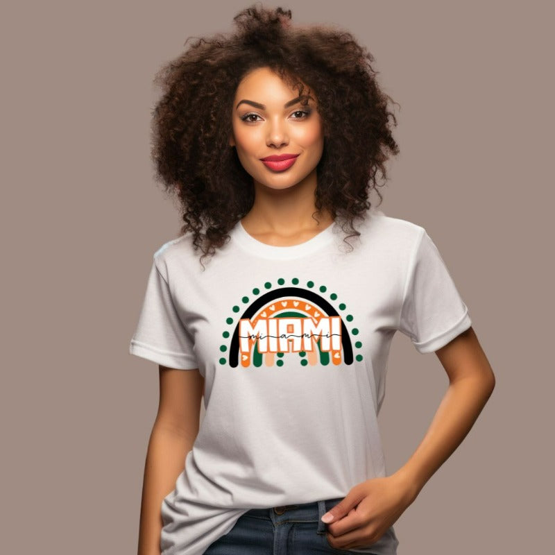 Bella + Canvas 3001 unisex shirt featuring a rainbow design in orange, green, and black with "Miami" text and decorative hearts and dots on a white shirt.