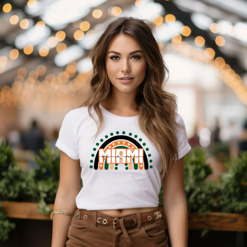 Bella + Canvas 3001 unisex shirt featuring a rainbow design in orange, green, and black with "Miami" text and decorative hearts and dots on a white shirt.