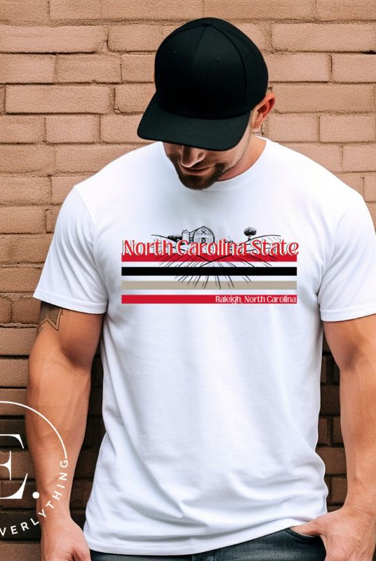NC State retro-inspired shirt paying homeage to the schools rich history and renowned agricultural programs. Design on a white colored shirt. 