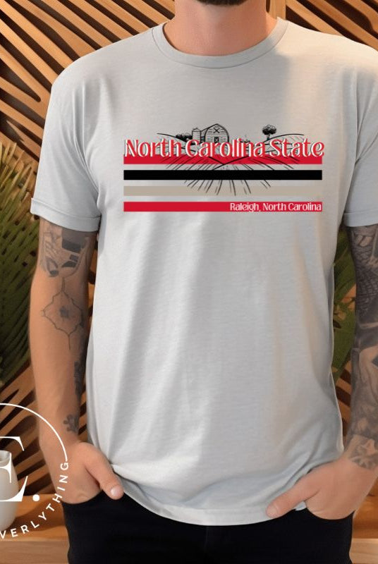 NC State retro-inspired shirt paying homeage to the schools rich history and renowned agricultural programs. Design on a ash colored shirt.