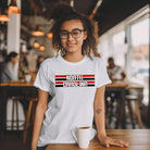 "North Carolina" in bold red and white text on a black and red striped background across the chest on a white shirt.