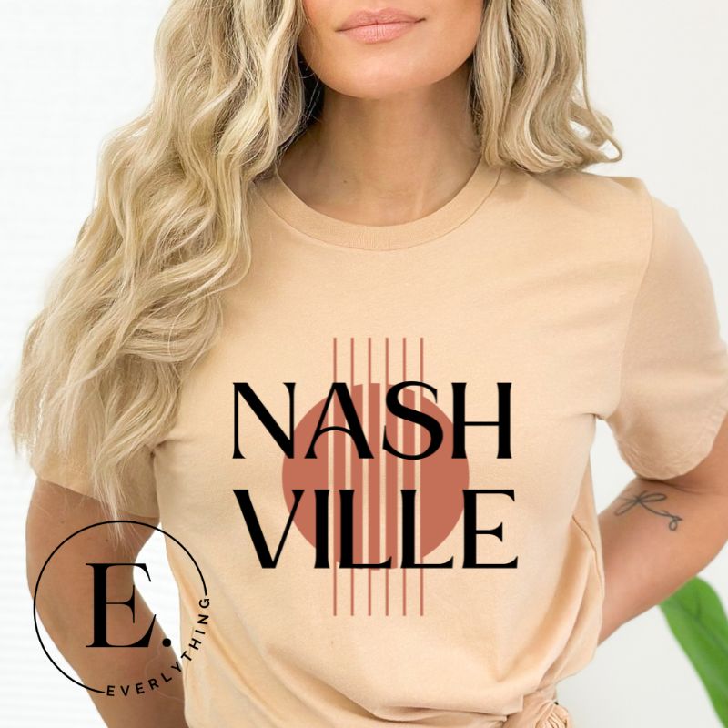 Capture the essence of Nashville with our minimalistic country western T-shirt. Featuring the iconic word "Nashville" with guitar strings silhouette, on a tan shirt. 
