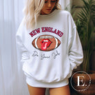 Cheer on the New England team in style with this unique sweatshirt, featuring a football and fun lips and tongue design. Emblazoned with the team's inspiring slogan "Do your Job" and the iconic New England wordmark, this comfortable white sweatshirt.