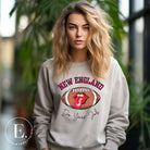 Cheer on the New England team in style with this unique sweatshirt, featuring a football and fun lips and tongue design. Emblazoned with the team's inspiring slogan "Do your Job" and the iconic New England wordmark, this comfortable grey sweatshirt. 