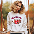 Cheer on the New England team in style with this unique sweatshirt, featuring a football and fun lips and tongue design. Emblazoned with the team's inspiring slogan "Do your Job" and the iconic New England wordmark, this comfortable white sweatshirt. 