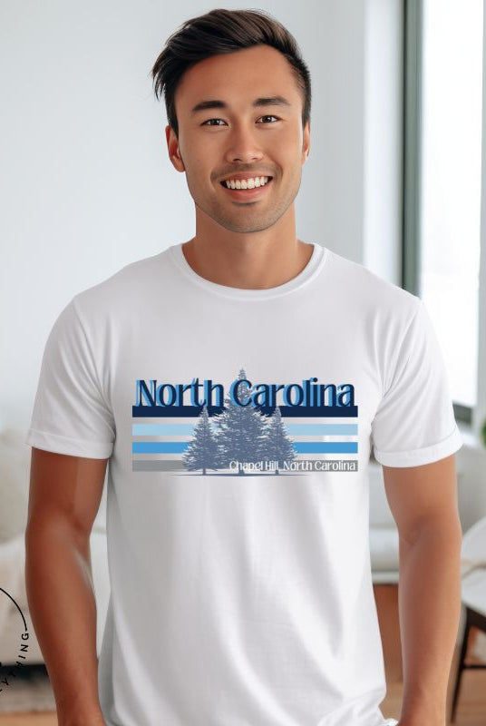 Show your school pride with this iconic North Carolina wordmark t-shirt. Made from premium materials, it features a North Carolina tree line in a the cool Carolina blue colors, representing a tradition of excellence for the nature that North Carolina offers on a white shirt. 