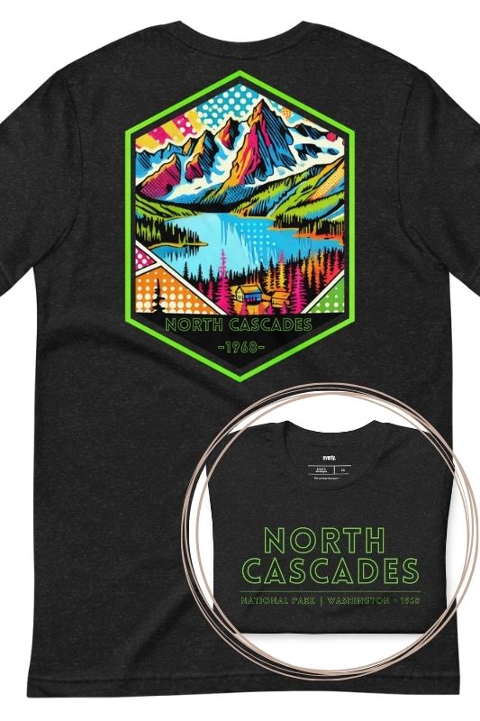 a vibrant, retro-style design of North Cascades National Park on the back, and "North Cascades National Park | Washington - 1968" text on the front on a black shirt.