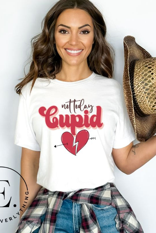 Spice up your Valentine's Day with our edgy shirt featuring a broken heart pierced by an arrow, and the defiant phrase "Not Today Cupid" on a white shirt. 