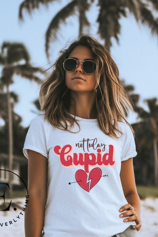 Spice up your Valentine's Day with our edgy shirt featuring a broken heart pierced by an arrow, and the defiant phrase "Not Today Cupid" on a white shirt. 