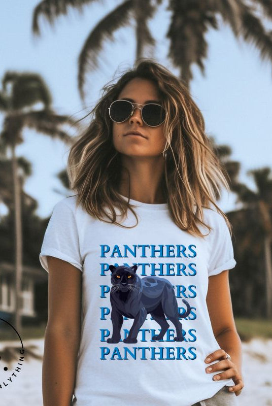 Show your Panthers pride with our Bella Canvas 3001 unisex graphic t-shirt featuring the dynamic 'Panthers Panthers Panthers Panthers' design, complete with a fierce black panther illustration on a white shirt. 