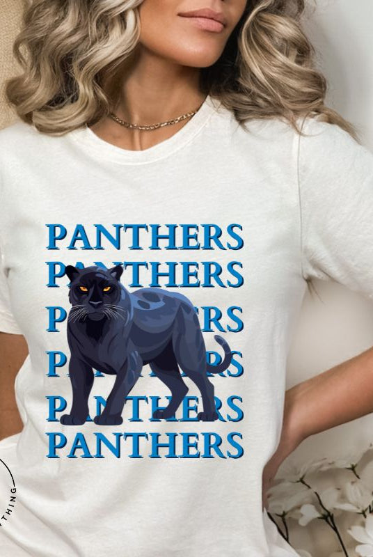 Show your Panthers pride with our Bella Canvas 3001 unisex graphic t-shirt featuring the dynamic 'Panthers Panthers Panthers Panthers' design, complete with a fierce black panther illustration on a white shirt.