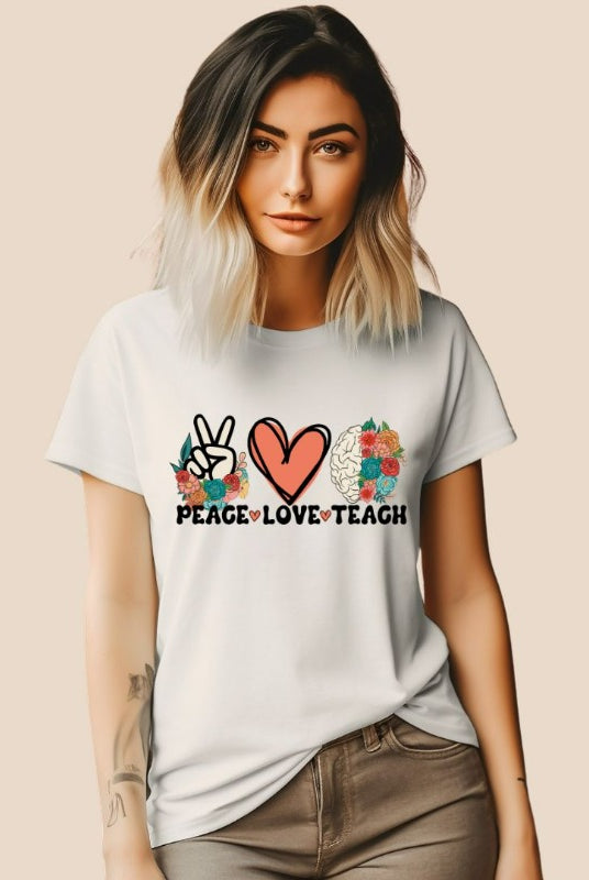 Floral design featuring the words 'peace love teach' on a teacher graphic tee - a great choice for teacher shirts and teacher gifts. Cream graphic tees. 
