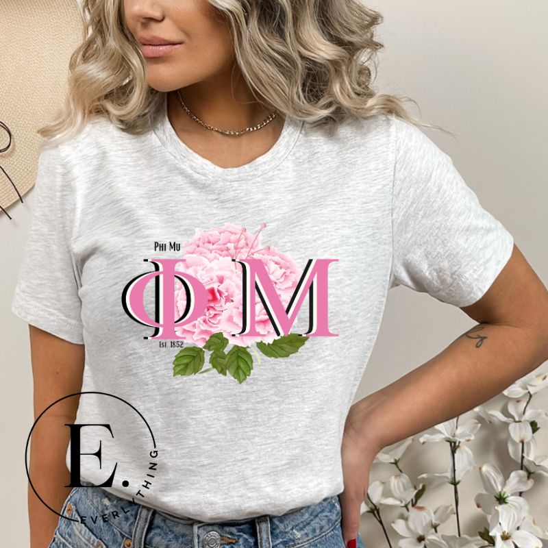Elevate your Phi Mu sisterhood with our premium sublimation t-shirt download. Featuring the sorority's letters and the vibrant pink carnation on a grey shirt. 
