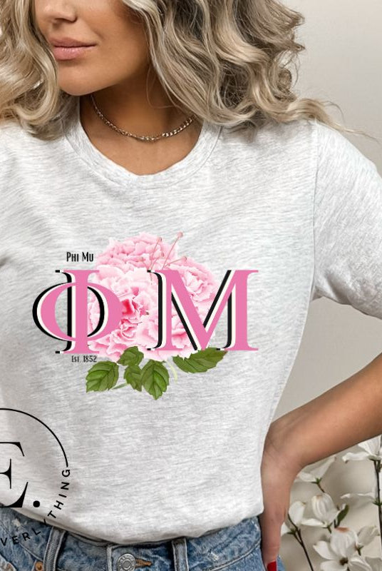 Looking for a stylish t-shirt to elevate your Phi Mu sisterhood? Our design features the sorority letters and beautiful pink carnations on a grey shirt. 