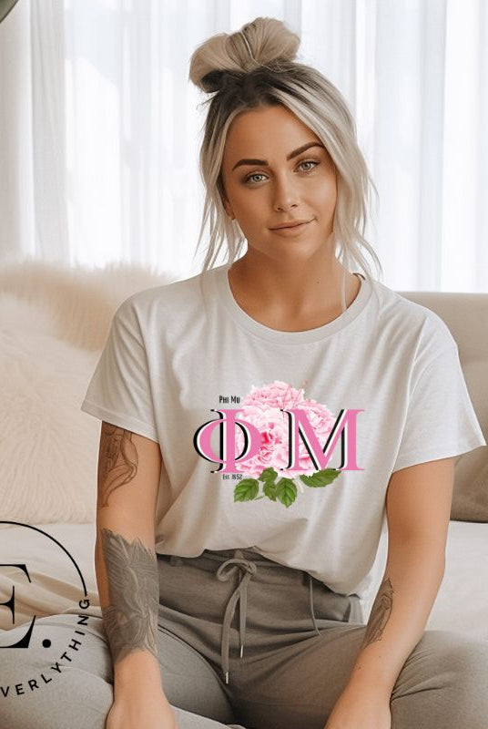 Looking for a stylish t-shirt to elevate your Phi Mu sisterhood? Our design features the sorority letters and beautiful pink carnations on a soft cream shirt. 