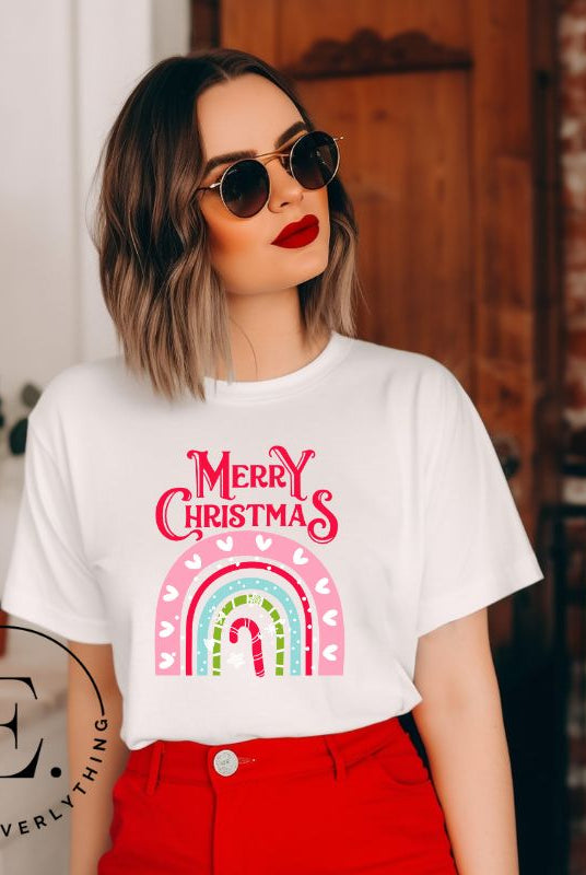 Merry Christmas rainbow candy cane and heart tee on a white shirt.