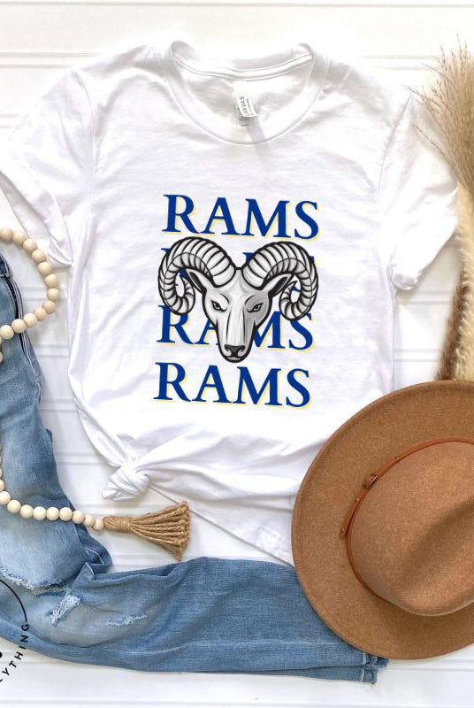 Unleash the Rams spirit with our Bella Canvas 3001 unisex tee! Elevate your game day style with the mantra 'Rams Rams Rams Rams' and a bold Rams head illustration on a white shirt. 