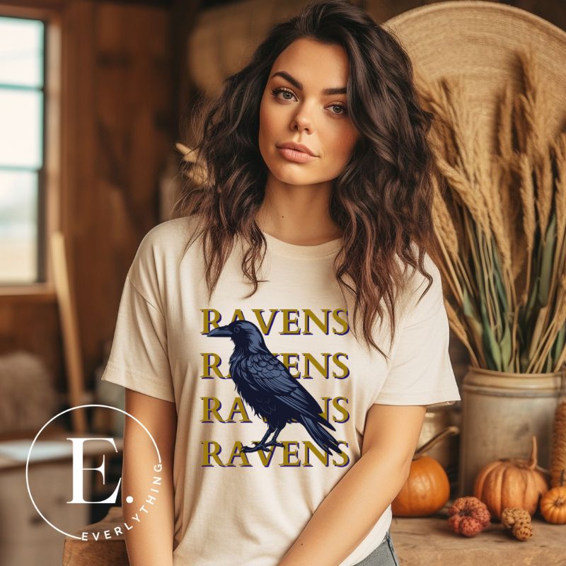 Fly high with our Bella Canvas 3001 unisex tee showcasing the spirited 'Ravens Ravens Ravens Ravens' design and a majestic Raven illustration on a soft cream shrit. 