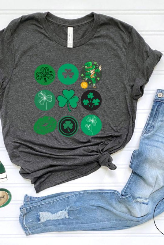 Celebrate Saint Patrick's Day in style with our Bella Canvas 3001 unisex graphic t-shirt! Get ready for the luckiest day of the year with our festive design featuring 3 rows of 3 vibrant and whimsical Saint Patrick's Day images on a dark grey shirt. 