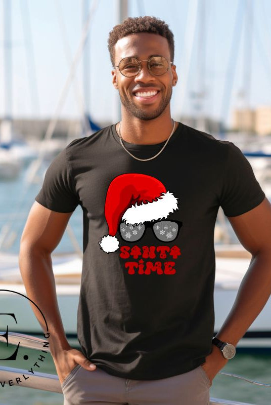Gear up for the holiday season with our men's Christmas Shirt featuring a Santa hat, Christmas sunglasses on a black colored shirt. 
