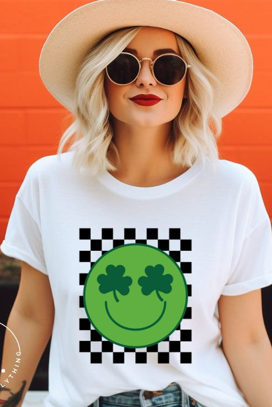 Get in the Saint Patrick's Day spirit with our Bella Canvas 3001 unisex graphic t-shirt! This unique design features a retro green smiley face with shamrock eyes, perfect for those seeking a festive and nostalgic look on a white shirt. 
