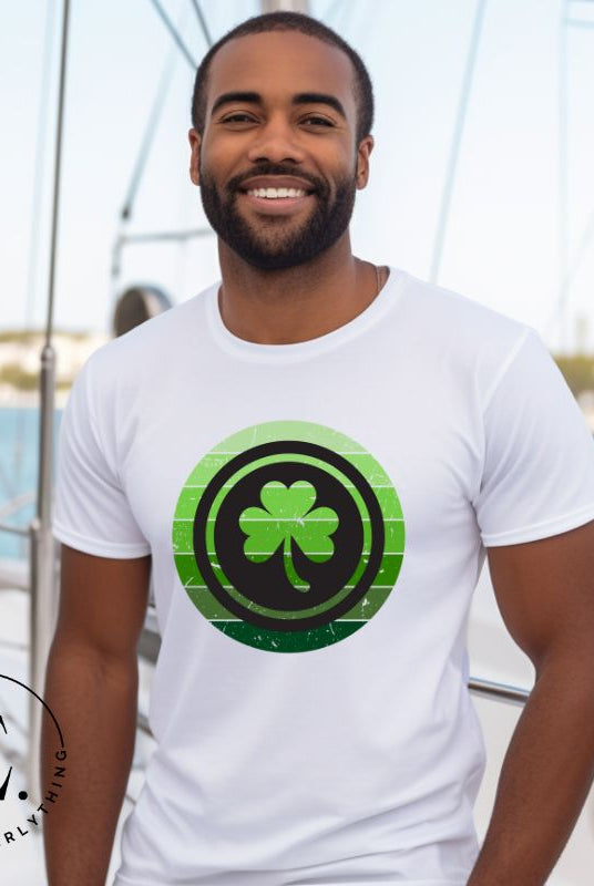 Get your ultimate Saint Patrick's Day attire with our Bella Canvas 3001 unisex graphic t-shirt! Featuring a captivating circle design in various shades of green, topped with a prominent shamrock, on a white shirt. 
