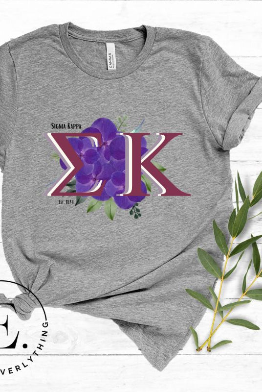 Looking for a way to showcase your Sigma Kappa pride? Look no further than our stylish t-shirt, featuring the sorority's iconic letters and the enchanting wild purple violets on a grey shirt.