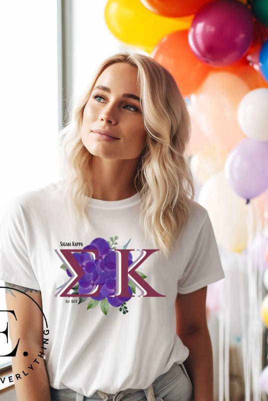 Looking for a way to showcase your Sigma Kappa pride? Look no further than our stylish t-shirt, featuring the sorority's iconic letters and the enchanting wild purple violets on a white shirt. 