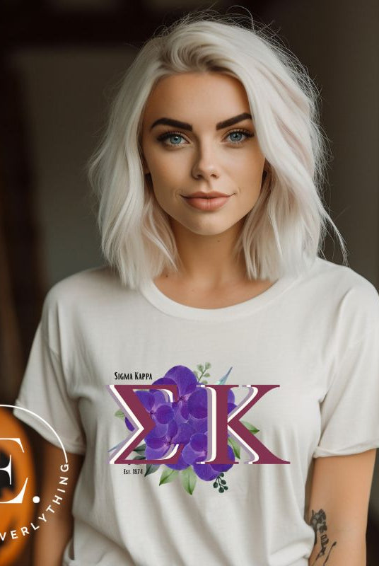 Looking for a way to showcase your Sigma Kappa pride? Look no further than our stylish t-shirt, featuring the sorority's iconic letters and the enchanting wild purple violets on a white shirt.