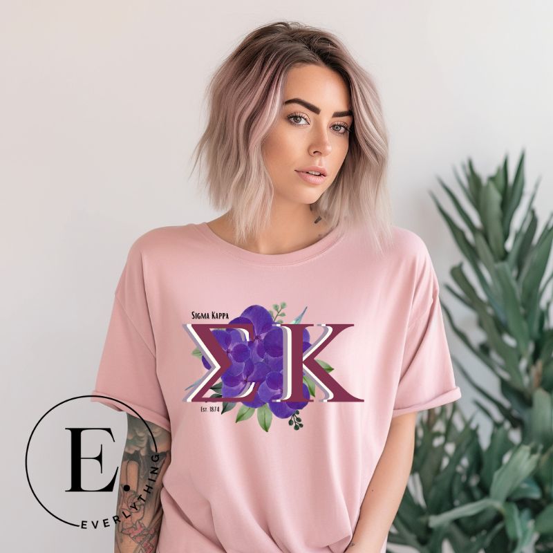 Elevate your Sigma Kappa sisterhood with our premium sublimation t-shirt download. Featuring the sorority's letters and the enchanting wild purple violets on a pink shirt. 